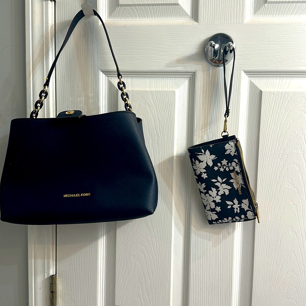 Michael Kors Navy blue white floral print jet set phone wallet.